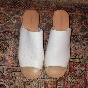 Never worn Jeffery Campbell Slides